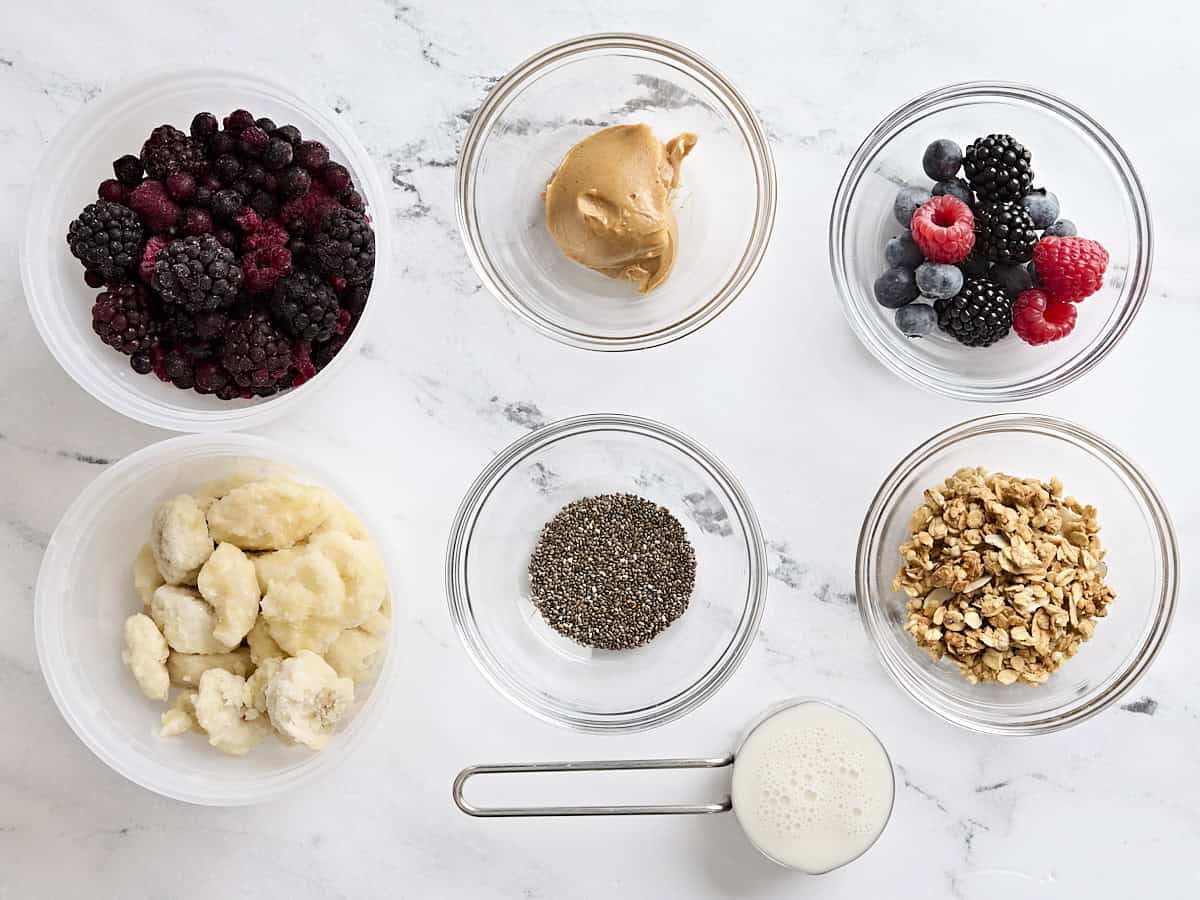 Overhead view of the ingredients needed to make smoothie bowls.