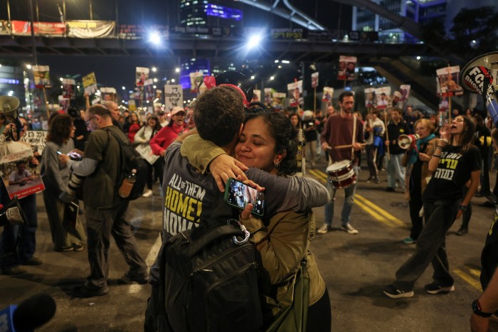 Supporters of Israeli hostages, kidnapped during the deadly attack by Hamas on October 7, 2023, react to news regarding ceasefire negotiations in Gaza.